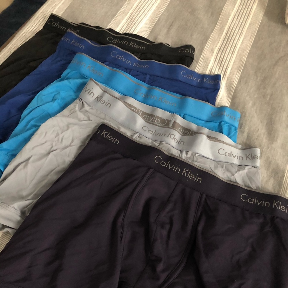 13 pairs of Calvin Klein underwear. Size small
